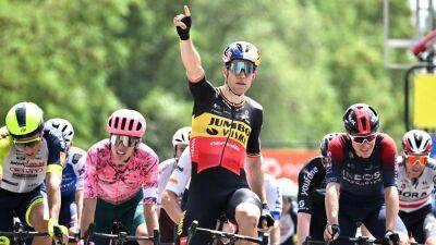 Wout van Aert sprints to victory from Ethan Hayter on opening stage of Criterium du Dauphine