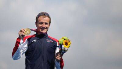 Triathlon-Blummenfelt first to go sub-seven hours, Matthews goes sub-eight in women's race - channelnewsasia.com - Britain - Norway