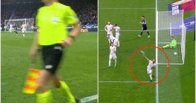 The shocking moment Armenia defender launches bottle at linesman for not giving offside