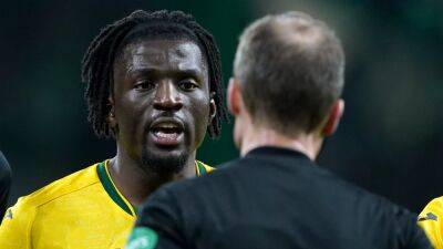 Hibernian sign defender Rocky Bushiri on permanent contract from Norwich
