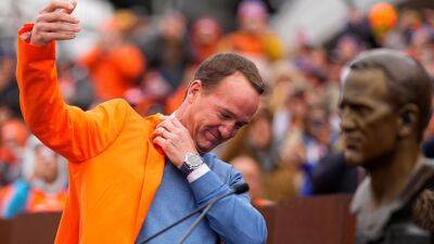 Group buying Denver Broncos discussing advisory role, ownership stake with Peyton Manning, sources say