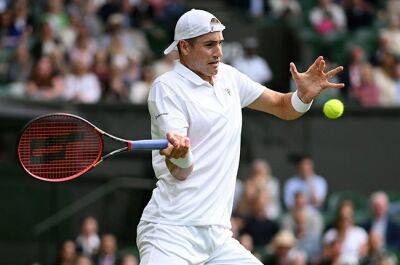 Isner out of Wimbledon despite new aces record