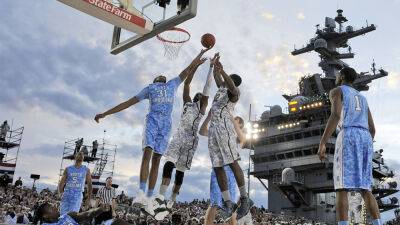 Mark J.Terrill - Barack Obama - Michelle Obama - Gonzaga, Michigan State set to play basketball on aircraft carrier - foxnews.com - state North Carolina - state Michigan - county Island - county San Diego
