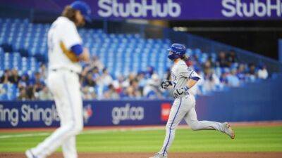 Blue Jays fall to short-handed Royals in series opener