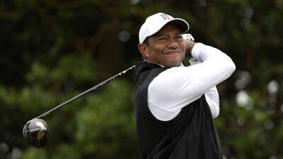 Tiger Woods struggles to make headway in unlikely bid to make Open cut