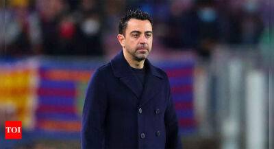 As Barcelona head to US, Xavi delayed because of Iran visits