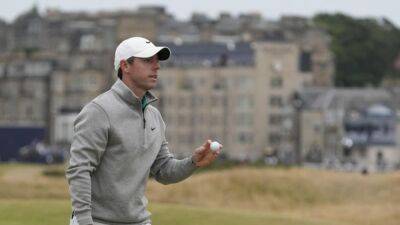 Sensational eagle and crowd lift McIlroy to top of Open leaderboard