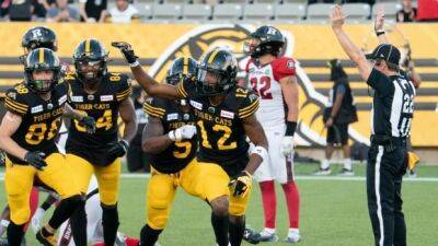 Tiger-Cats scratch out 1st win of season against winless Redblacks