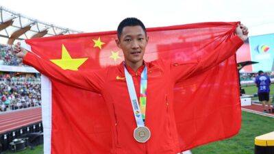 China's Wang grabs world long jump gold with final leap - channelnewsasia.com - Switzerland - China - Jamaica - Greece