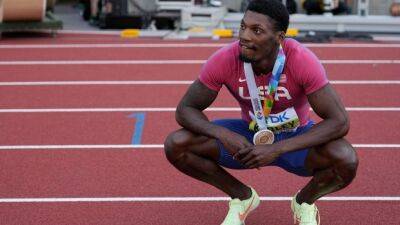 Kerley leads red, white , blue sweep of men's 100 metres at worlds