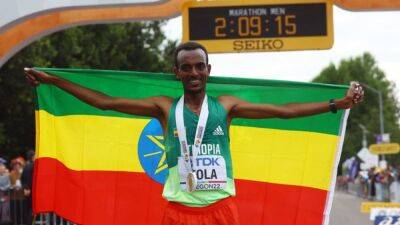 Ethiopa's Tola takes dominant marathon gold - channelnewsasia.com - Belgium - Usa - Ethiopia -  Tokyo -  Paris - state Oregon - Somalia