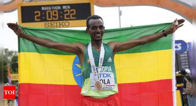 Ethiopia's Tamirat Tola wins world men's marathon - timesofindia.indiatimes.com - Belgium -  Doha - Ethiopia -  Berlin - Kenya