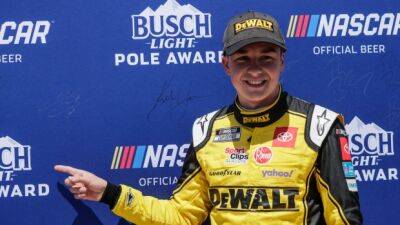 Bell crashes NASCAR playoff field with win at New Hampshire