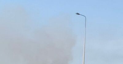 Huge emergency response as crews tackle major grass fire in soaring heat near Salford - manchestereveningnews.co.uk - Manchester