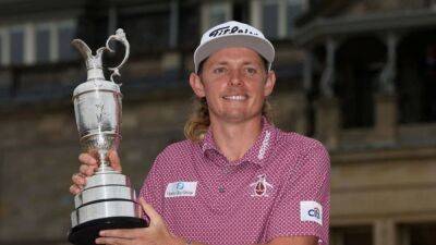 Two beers in a Claret Jug for Open winner Smith