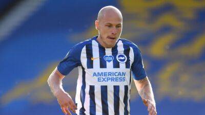 Celtic sign Australia midfielder Aaron Mooy and German defender Moritz Jenz