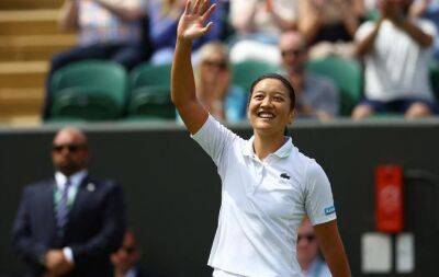 Serena's conqueror Tan into Wimbledon fourth round
