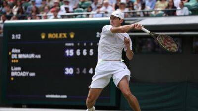 De Minaur happy not to be centre of attention