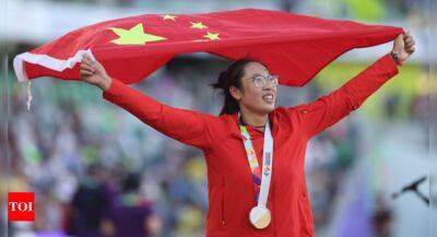World Athletics Championships: China's Feng Bin stuns women's discus for gold