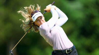 Henderson sweeps into three-shot lead at Evian