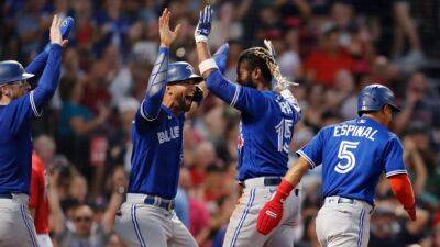 Blue Jays break run, hit records in rout of Red Sox