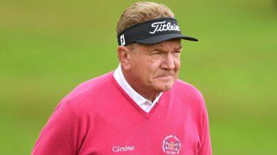 Darren Clarke slips back but birdies final hole to secure share of lead with Paul Broadhurst at Senior Open