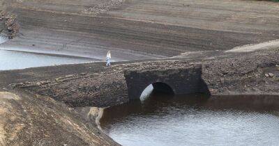 The old bridge that can now been seen in a Pennine reservoir after water levels dropped