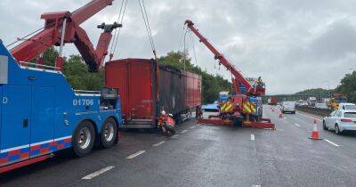 Picture shows burnt-out lorry that caught fire on M62 sparking HUGE 10-mile queues - manchestereveningnews.co.uk