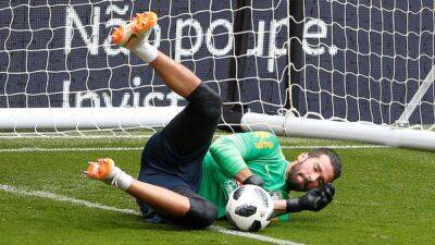 Diogo Jota - Juergen Klopp - Alisson Becker - Liverpool's Alisson recovering but will miss Salzburg friendly -Klopp - channelnewsasia.com - Manchester - Germany - Portugal - Brazil - Austria - Thailand