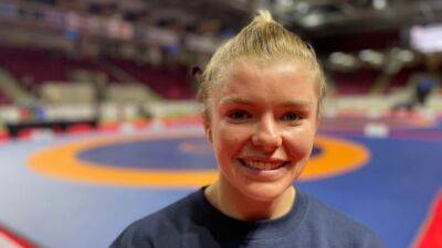Island-born wrestler Hannah Taylor wins gold at international competition in her hometown