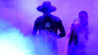 Israel Adesanya's Undertaker-themed entrance had the sports world buzzing on social media