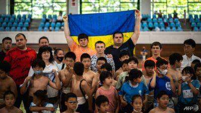 Far from war, Ukraine sumo team train for global glory in Japan