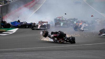 Zhou Guanyu’s Alfa Romeo overturns in first-lap crash at British Grand Prix