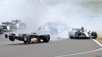 Guanyu Zhou - Alexander Albon - Protesters storm British GP track after crash - channelnewsasia.com - Britain - China