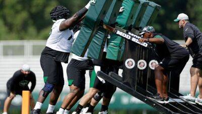 New York Jets coach Robert Saleh says he's concerned over use of new protective helmet shells