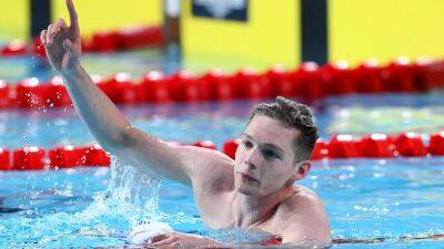 Commonwealth Games: Duncan Scott wins 200m freestyle, England women take gymnastics gold