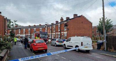 BREAKING: Road taped off as firefighters called to Stockport house blaze - live updates