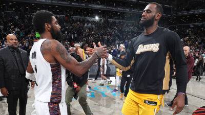 LeBron James 'rooting hard' for Lakers to acquire Kyrie Irving: report