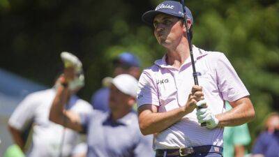 Poston holds on for wire-to-wire victory at John Deere