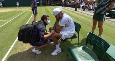 Nick Kyrgios seeks medical attention during Wimbledon clash in injury scare