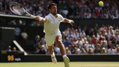 Novak Djokovic rallies from 2 sets down to defeat Jannik Sinner, reach Wimbledon semifinals