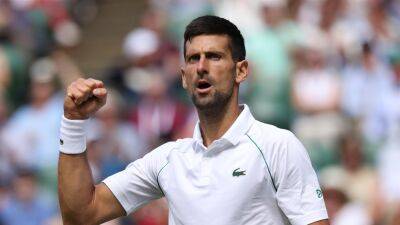 Wimbledon: Novak Djokovic roars back from two sets down to battle past Jannik Sinner and reach semi-finals