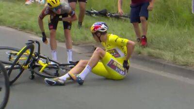 Wout van Aert crashes, nearly hits car in shocking day for yellow jersey at Tour de France