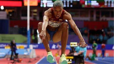 Olympic triple jump champ barred from track and field worlds over shoe issue
