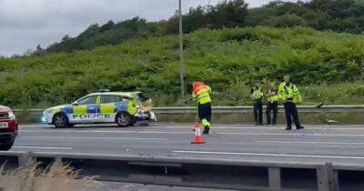 M60 crash between police car and van shut all lanes near Salford