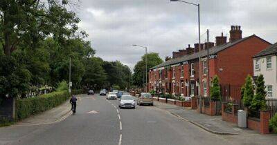 Drink-drive arrest after car flips and blocks busy Manchester road in serious crash
