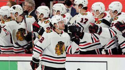 Sens acquire F DeBrincat from Blackhawks for 7th overall pick, two other picks