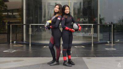 Indoor skydiving world champ Kyra Poh on flying high with sister Vera: 'One day, she will be better than me' - channelnewsasia.com - Belgium - Singapore -  Singapore
