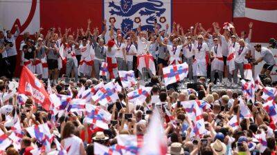 England fans cheer heroic Lionesses at Trafalgar Square victory celebrations
