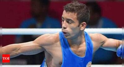 CWG 2022: Boxers Amit Panghal, Mohammad Hussamuddin cruise into quarterfinals - timesofindia.indiatimes.com - Scotland -  Tokyo - India - Bangladesh - Vanuatu